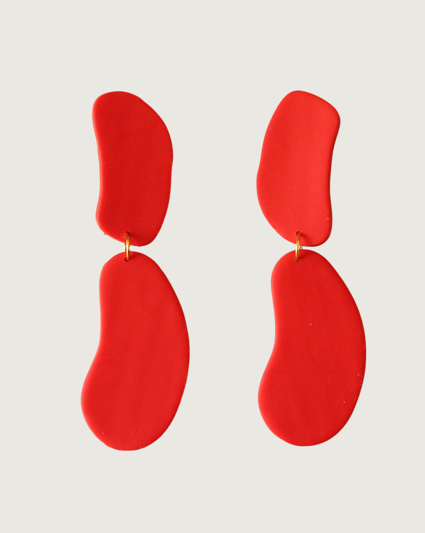 AROS ROJOS DOS PIEZAS IRREGULARES ROSA