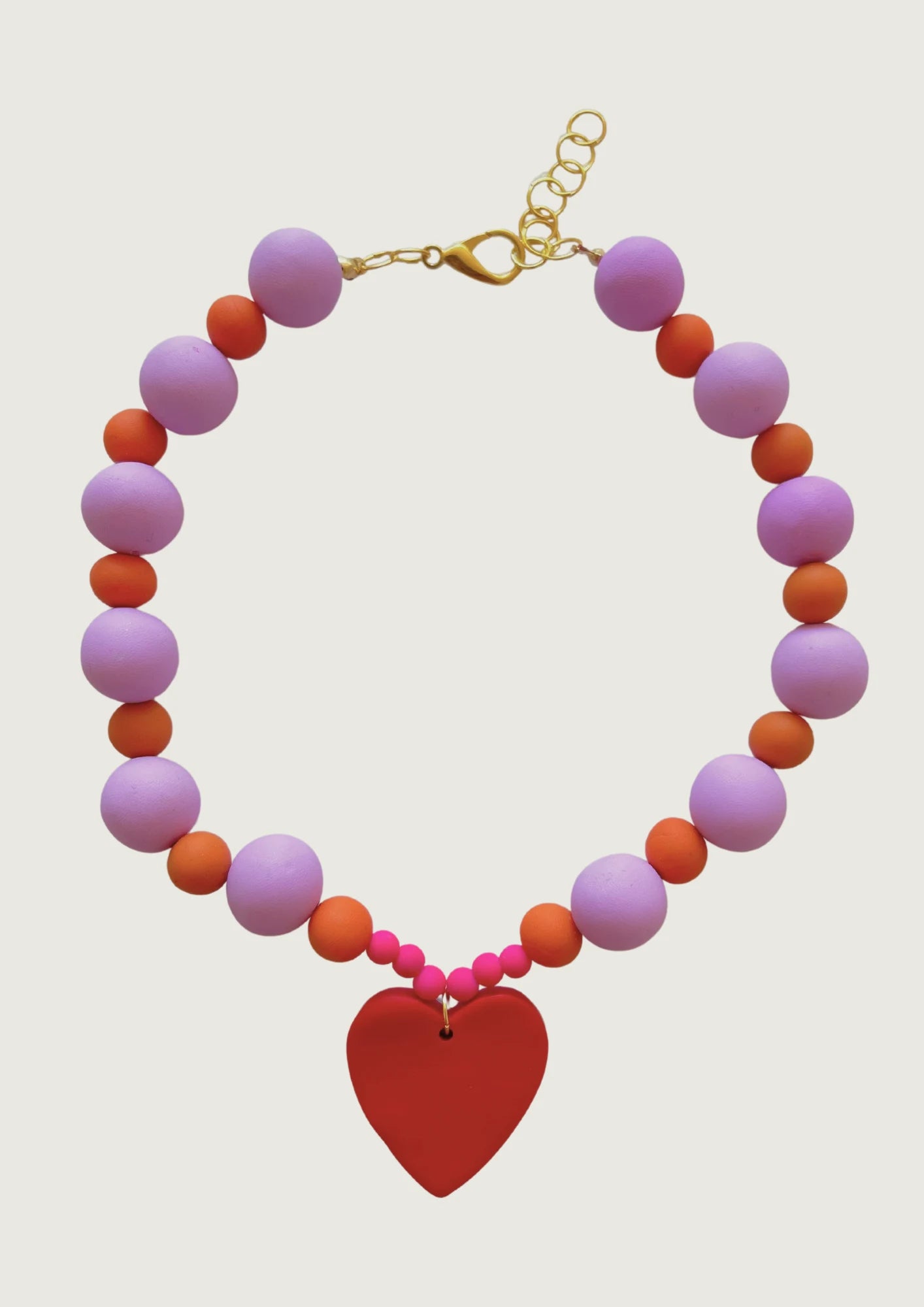 COLLAR PELOTAS NARANJO LILA BRUNA