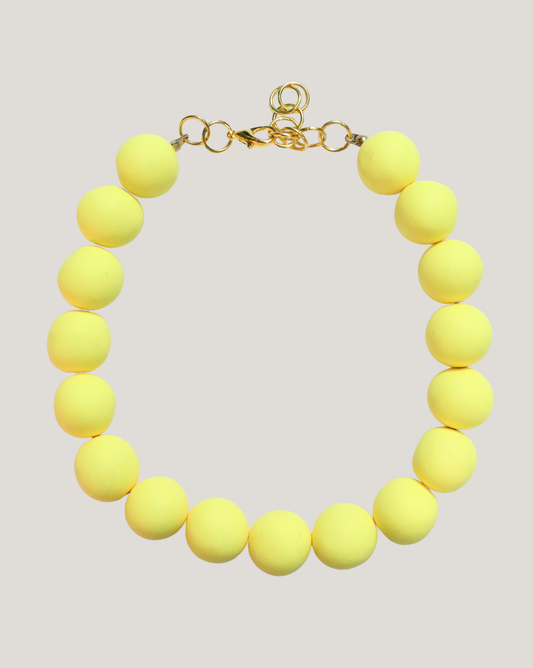 COLLAR PELOTAS AMARILLO MANTEQUILLA