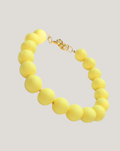 COLLAR PELOTAS AMARILLO MANTEQUILLA