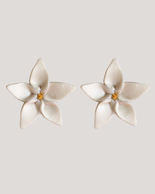 AROS FLOR DESTELLO PERLA DORADO