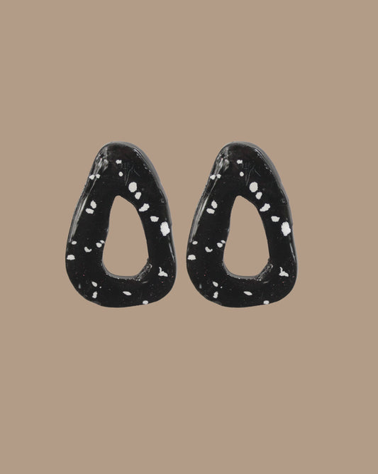 AROS NEGROS MANCHAS BLANCAS ROSE