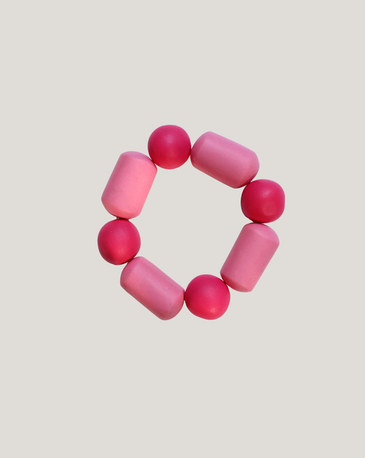 PULSERA ESFERASY TUBOS ROSADO FUCSIA